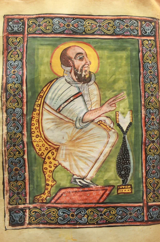 Evangelist portrait of St Mark from the Garima Gospels, seated with a gold halo.