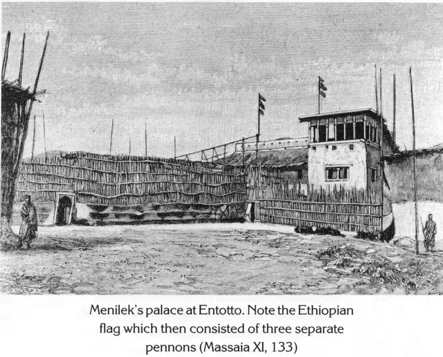 A view of the palace of Menelik II at Entotto, featuring a fortified enclosure and a multi-story building with flags.