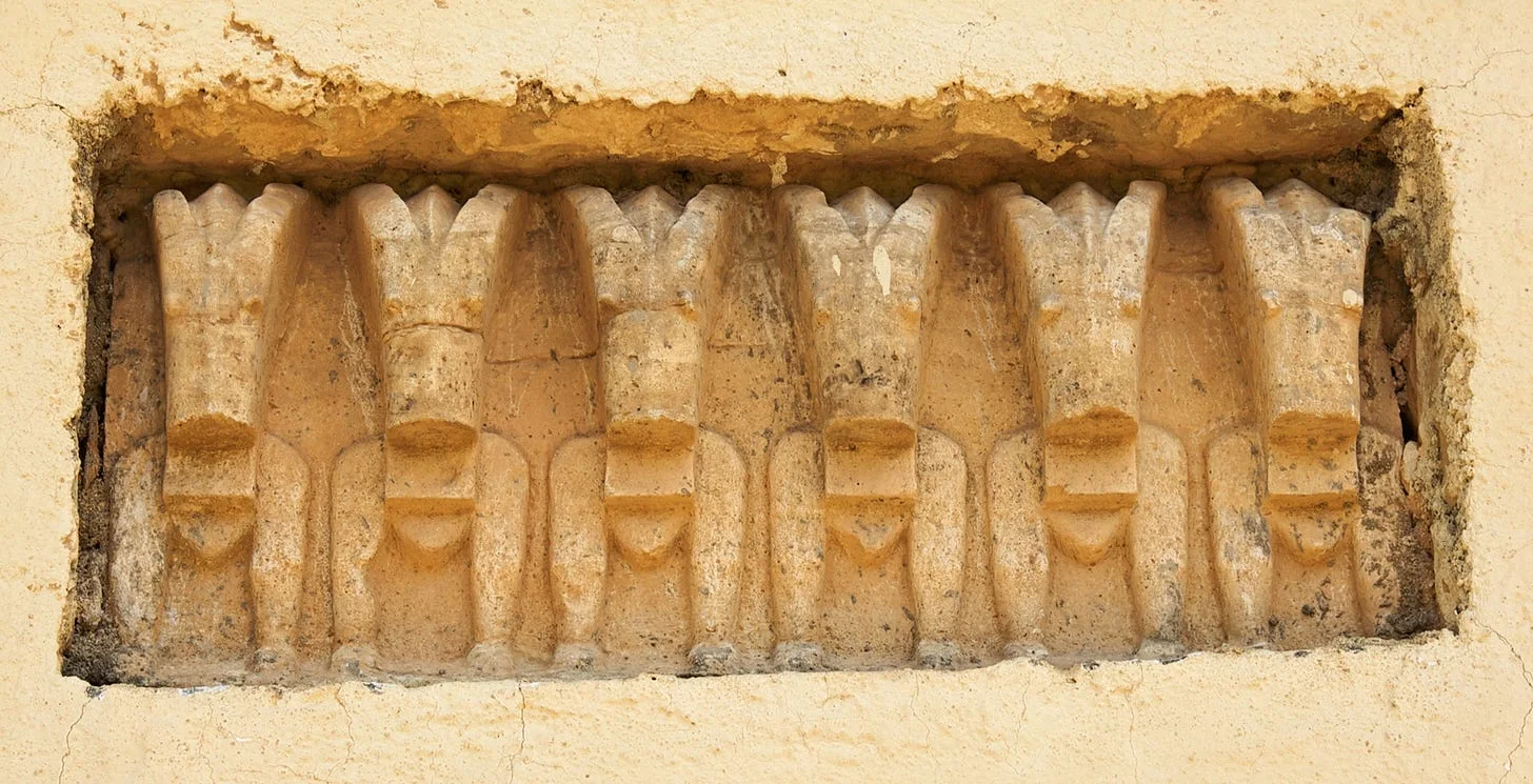 Ibex carvings, now part of the exterior of the Abba Afsé Church at Yəḥa. Source.