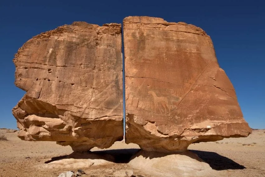 Split rock as if cut by a razor, Tayma. Source: Mysteries and Mysticism in the Arabian Desert, Figure 2.