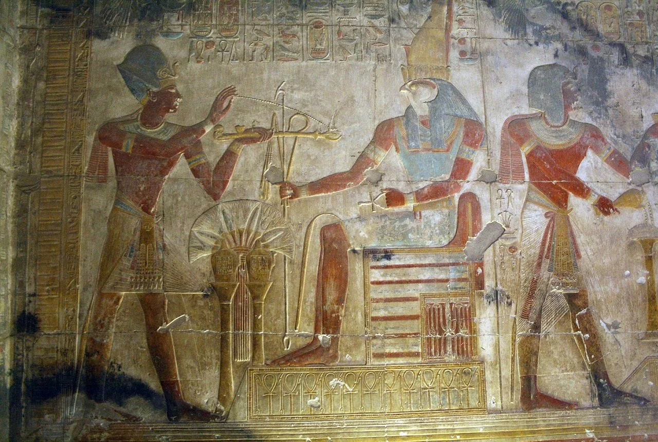 Pharaoh Seti I presenting an incense offering to the god Horus. Source