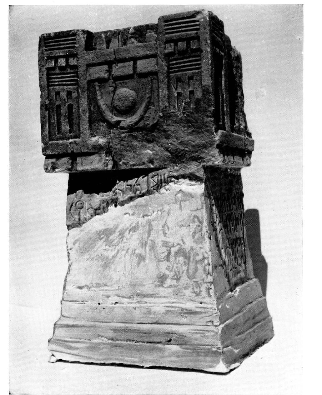 Reconstructed limestone incense altar JE 4 bearing RIÉ 8 on its visible faces