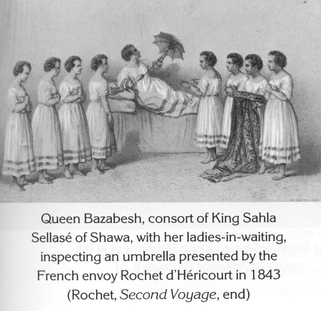 Queen Bazabesh, consort of King Sahla Sellasé of Shawa, with her ladies-in-waiting, inspecting an umbrella presented by the French envoy Rochet d'Héricourt in 1843 (Rochet, Second Voyage, end)