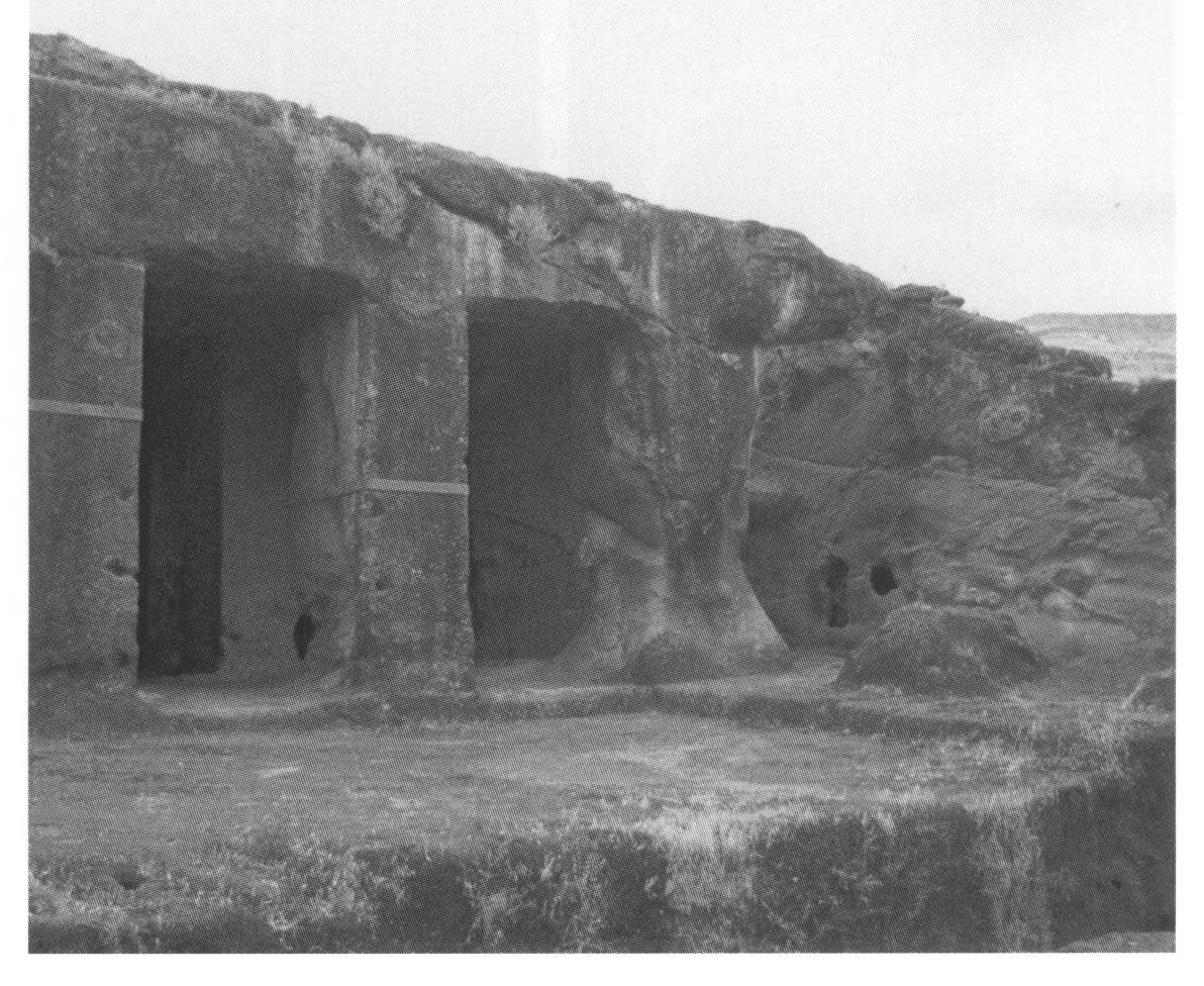 205 Beta Merkurios, the colonnade of massive square pillars on the northeast side of the rectangular open court, c. 1970.