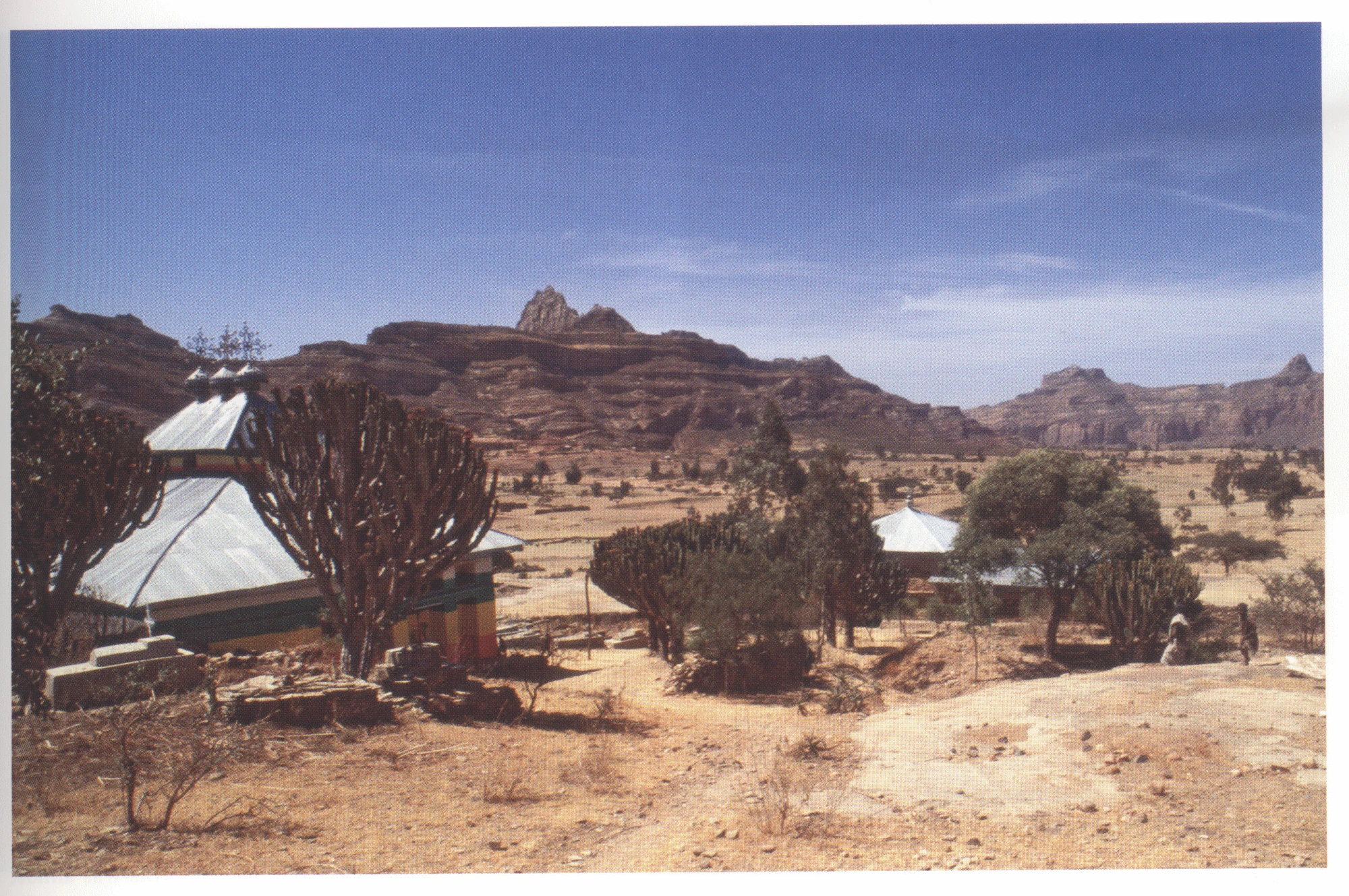 122 Degum, view of the rock outcrop from the northeast, 2006. The modern church of Sellassie is on the left.