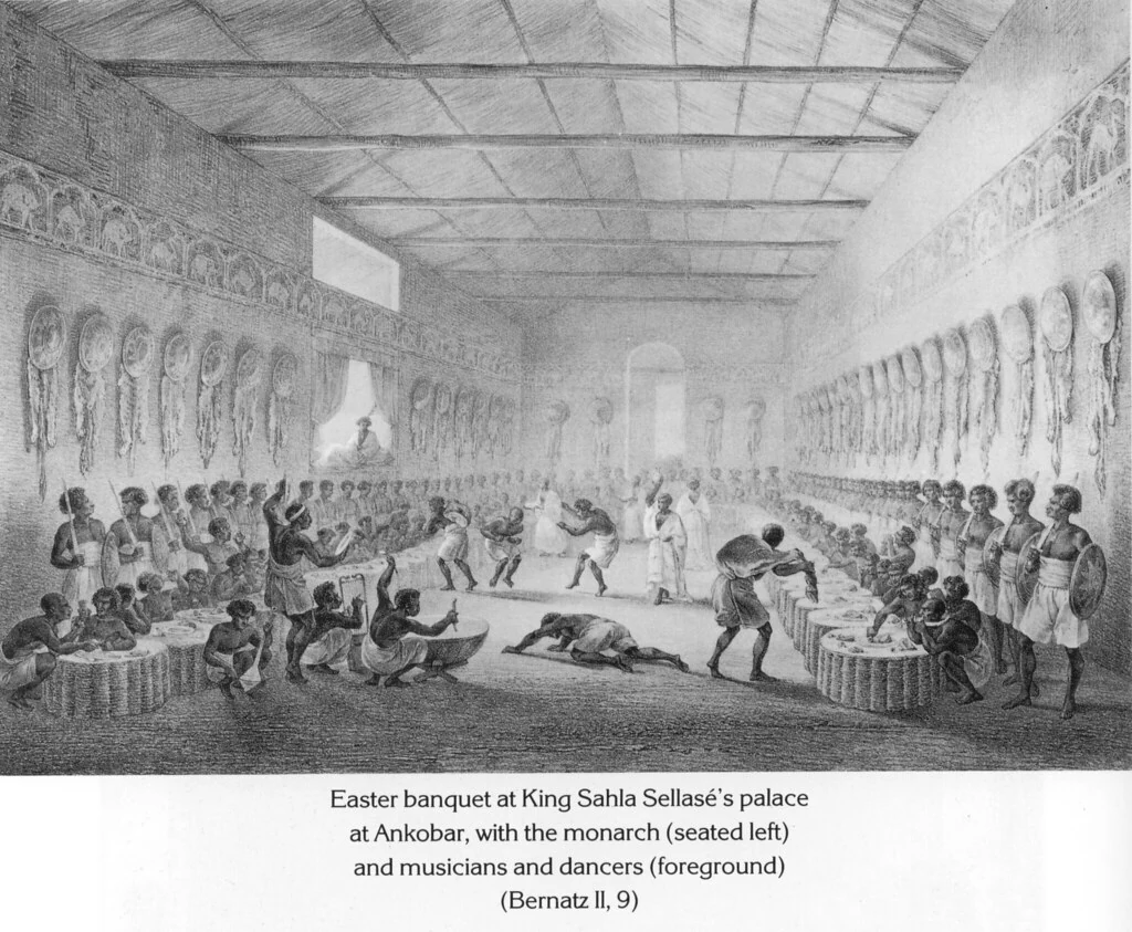 Easter banquet at King Sahla Sellasé's palace at Ankobar, with the monarch (seated left) and musicians and dancers (foreground) (Bernatz II, 9)