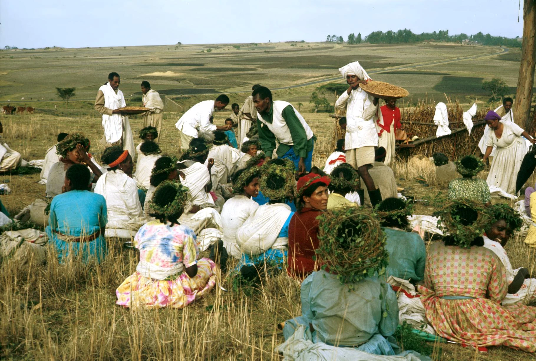 Pouring Grain into Hide on Back to Take to Temple of a Spirit