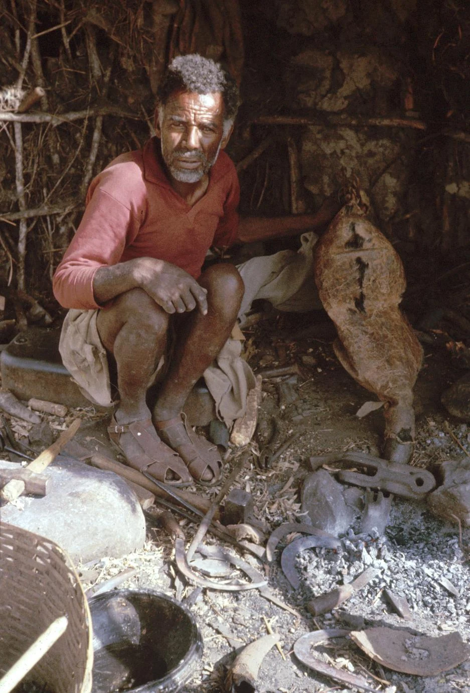 Blacksmith Posing in His Shop