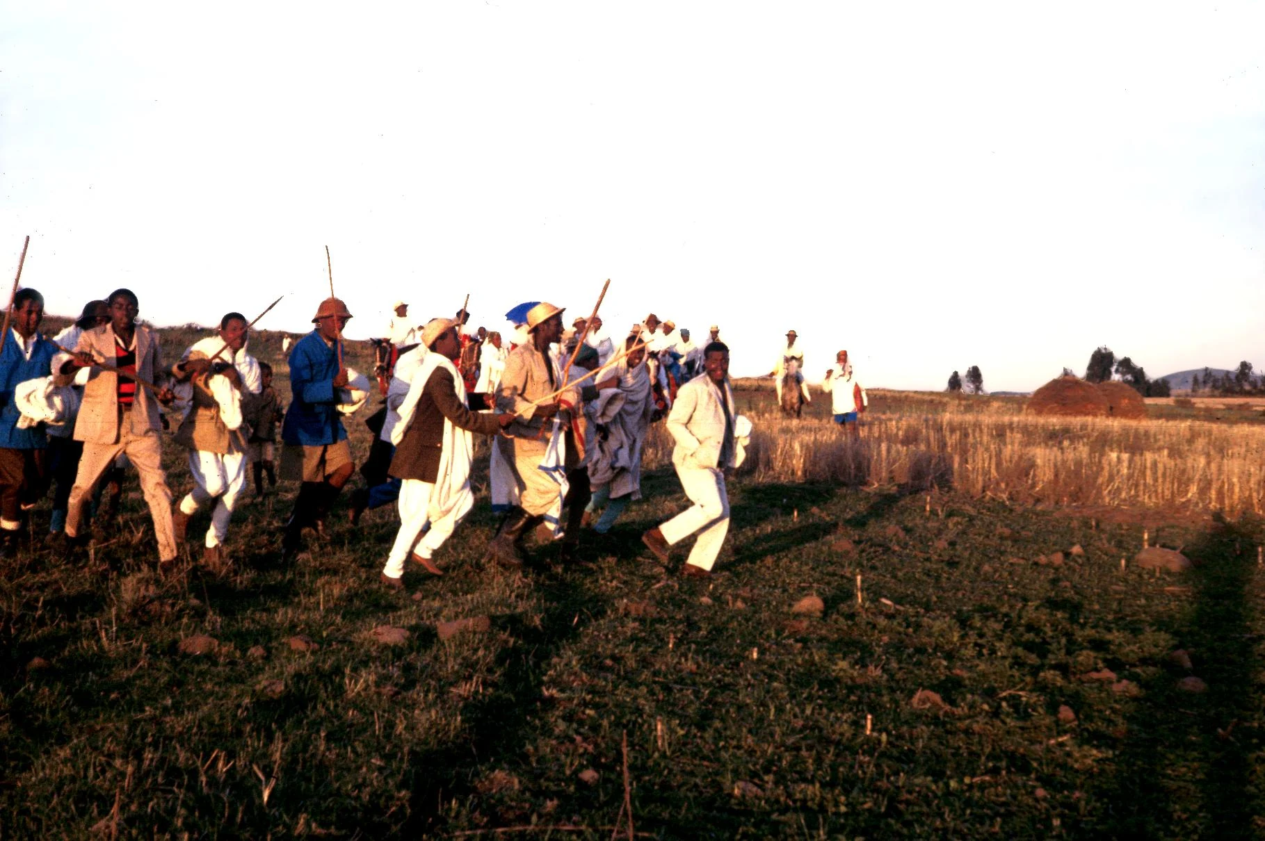 Men of Groom's Village Acting Out Mock Attack on Bridal Party