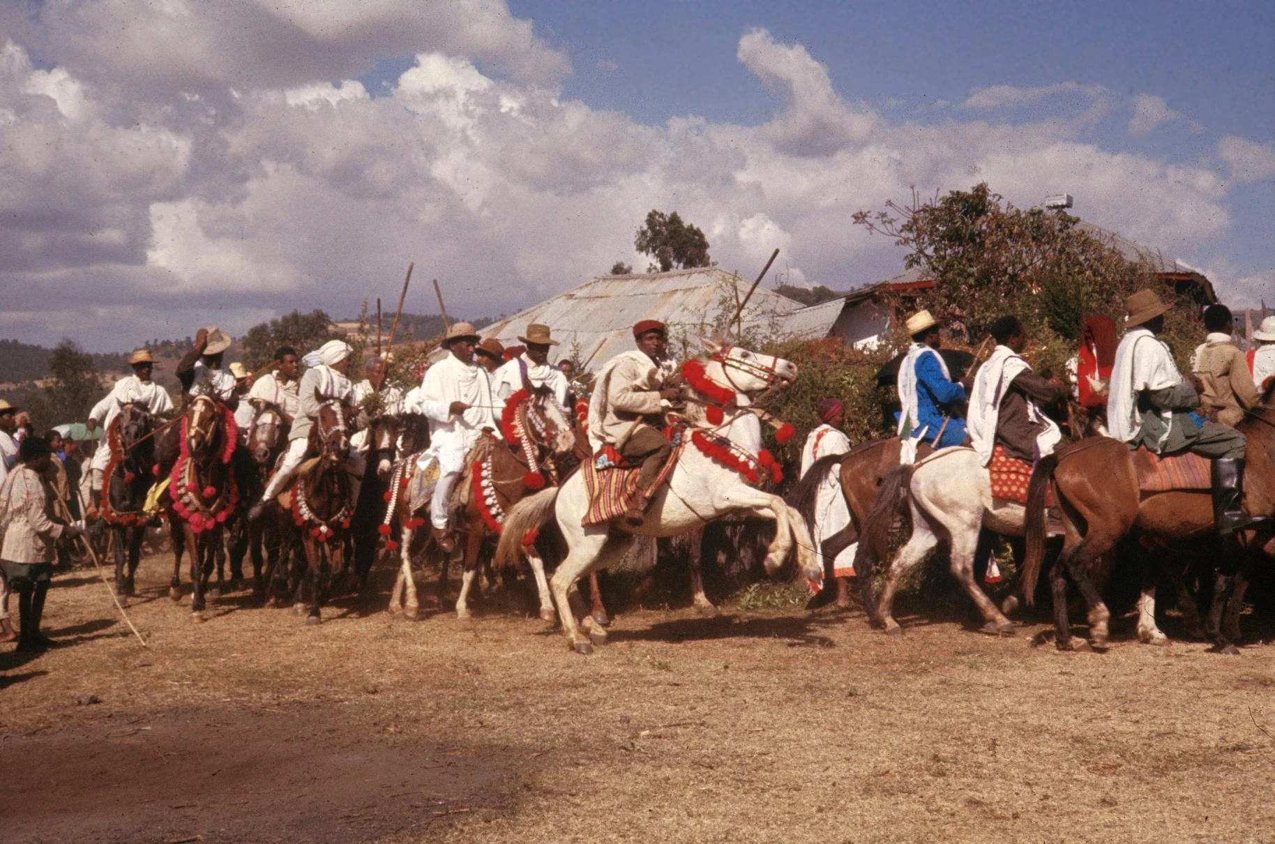 Mounted Horsemen Bringing Greenery as an Offering to the Spirits