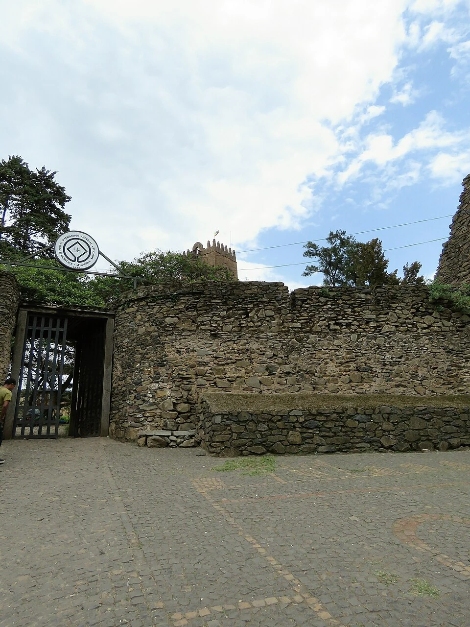 Fasil Ghebbi: stone perimeter wall and entrance gateway.