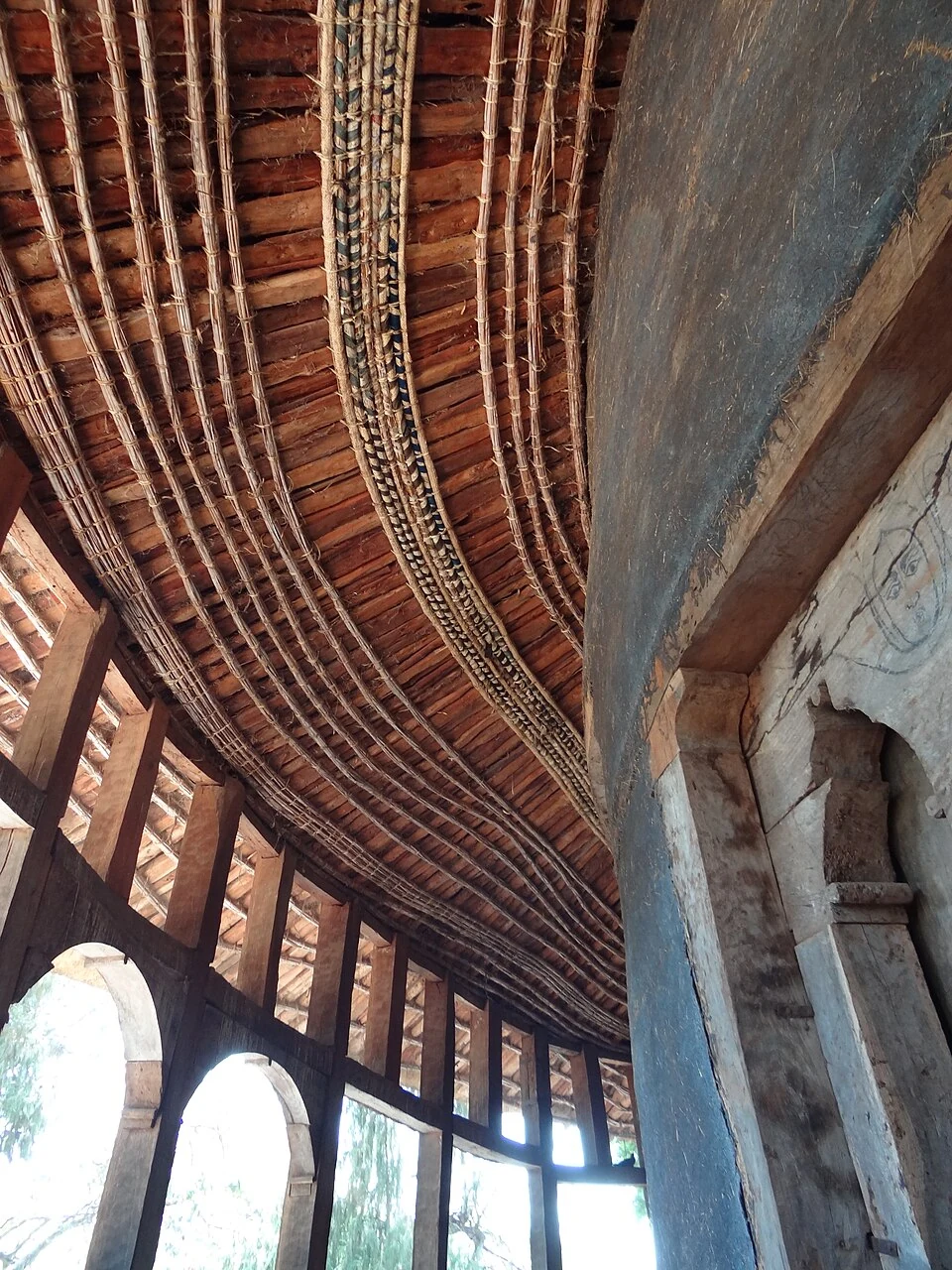 Roof structure and carved wall recesses at Ura Kidane Mehret.