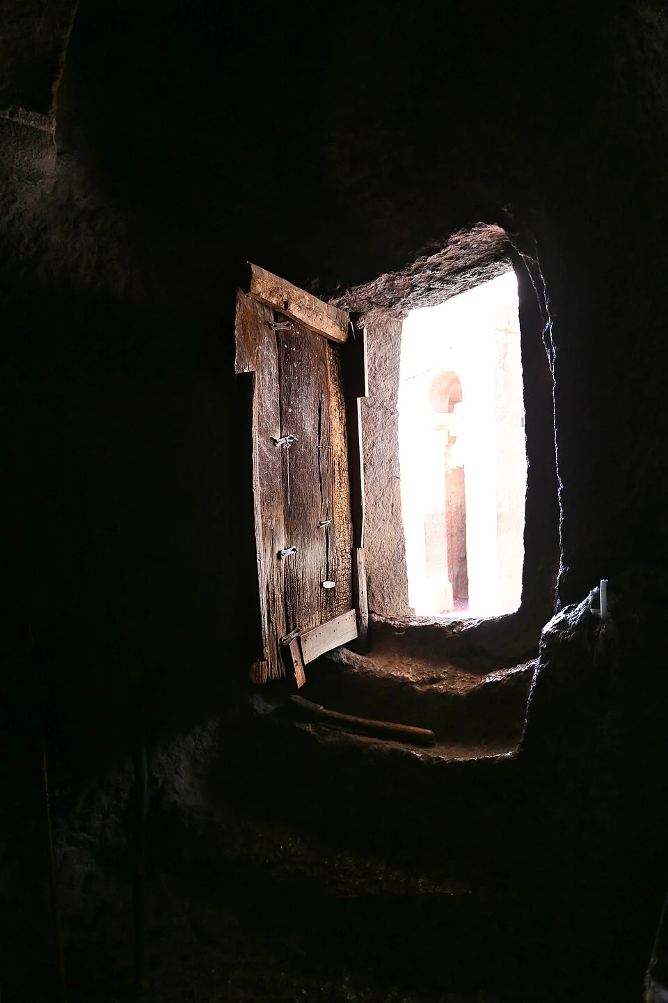 Biete Denagel: window opening in the rock-cut interior.