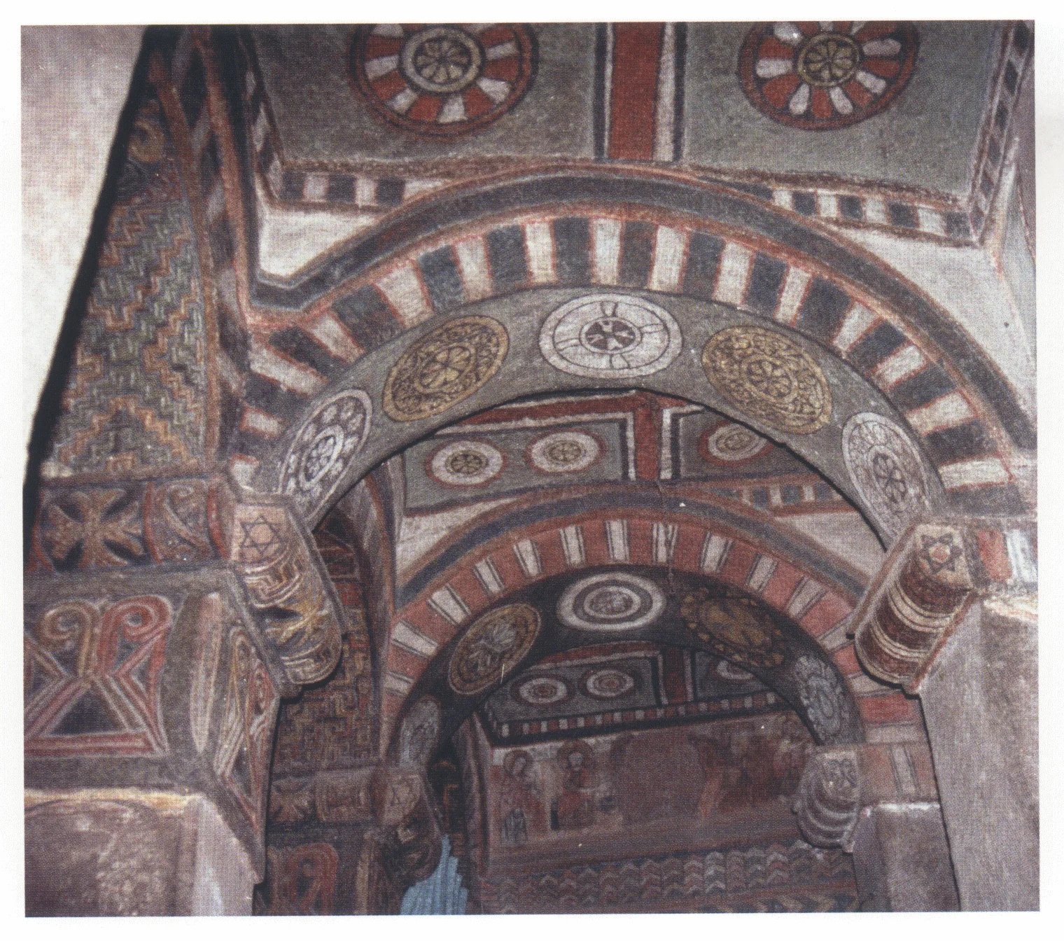 Beta Maryam, view eastward along the south aisle, showing the painted ceiling and the Annunciation scene on the end-wall, 1998.