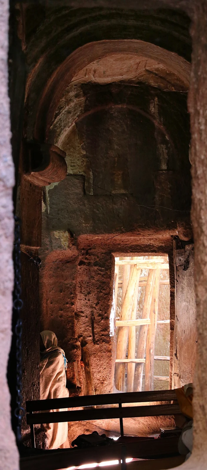 Bilbila Chirkos: rock-cut interior pillar and window opening.