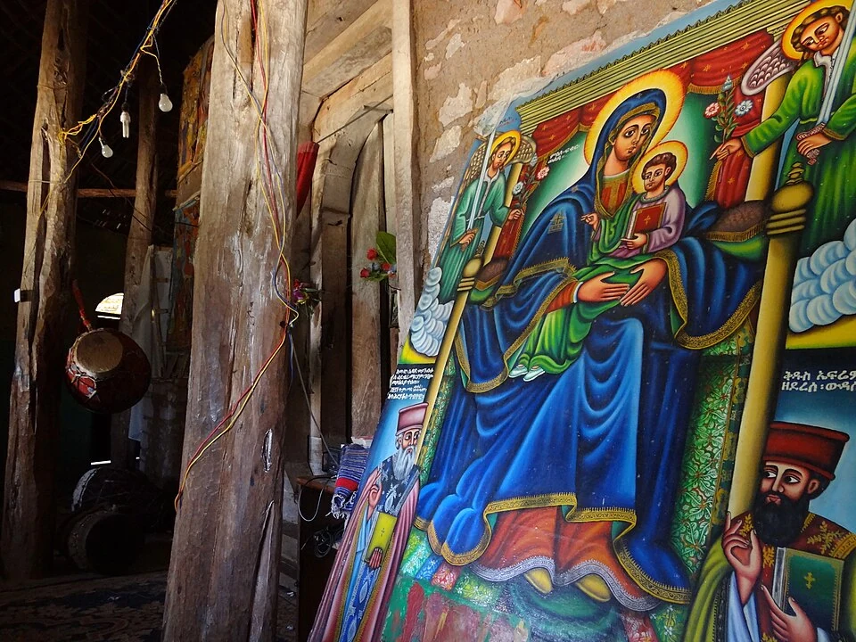 Painted interior and timber posts at Debre Maryam Monastery, Lake Tana.