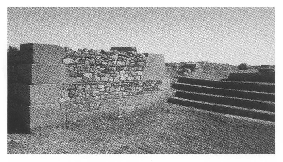 Aksum, Enda Kaleb, superstructure, 1992. This view shows the southwest corner of the basilica over the Tomb of Kaleb, and the northern part of the stair leading to the court which links the two basilicas. The lintel over the entrance to the tomb is just visible behind the wall.
