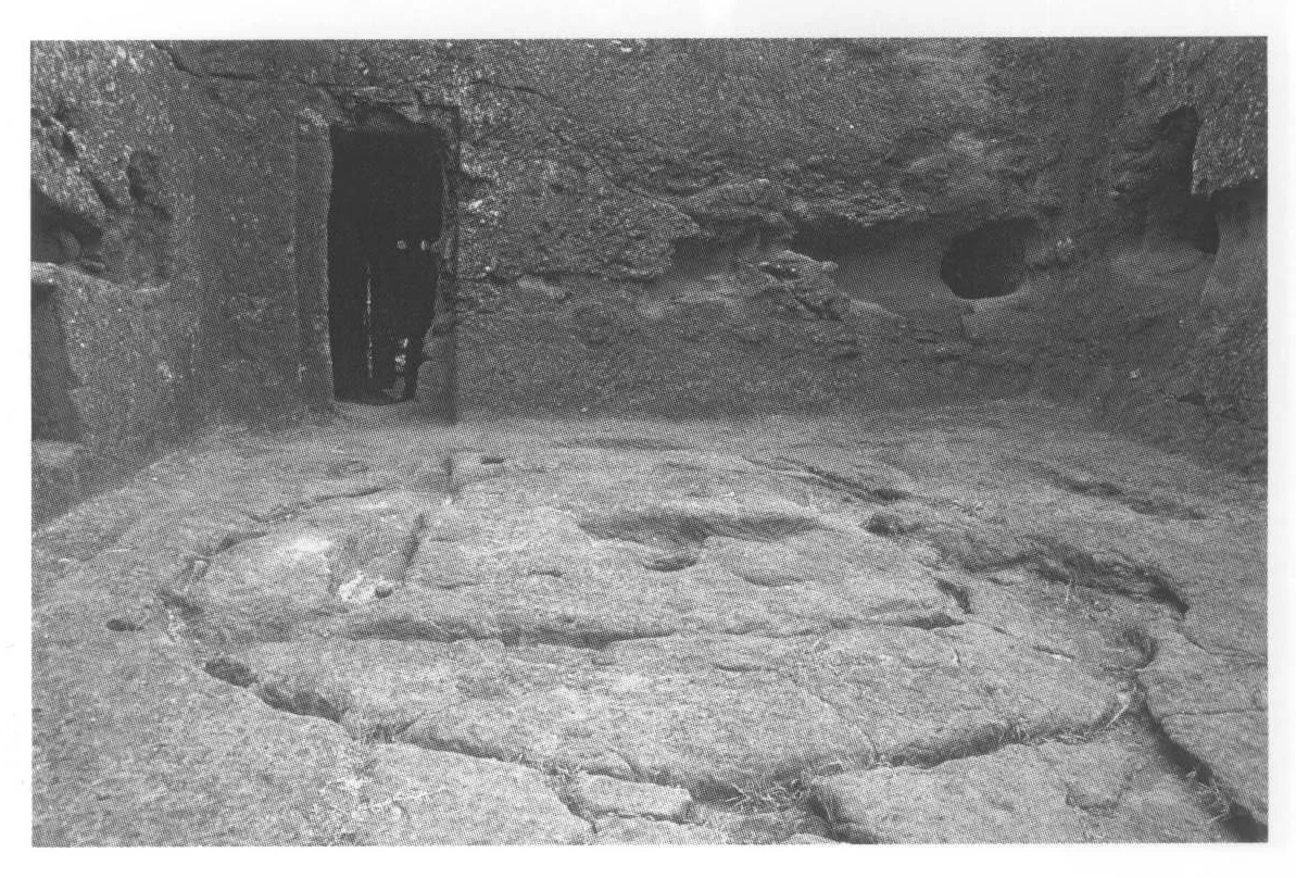 Beta Gabriel-Rafa’el, the northeast end of the trapezoidal court, 2007. The doorway leads to a small chamber with a door to the void created by excavation of the north-south trench. In the floor of the court is the foundation of a circular structure.