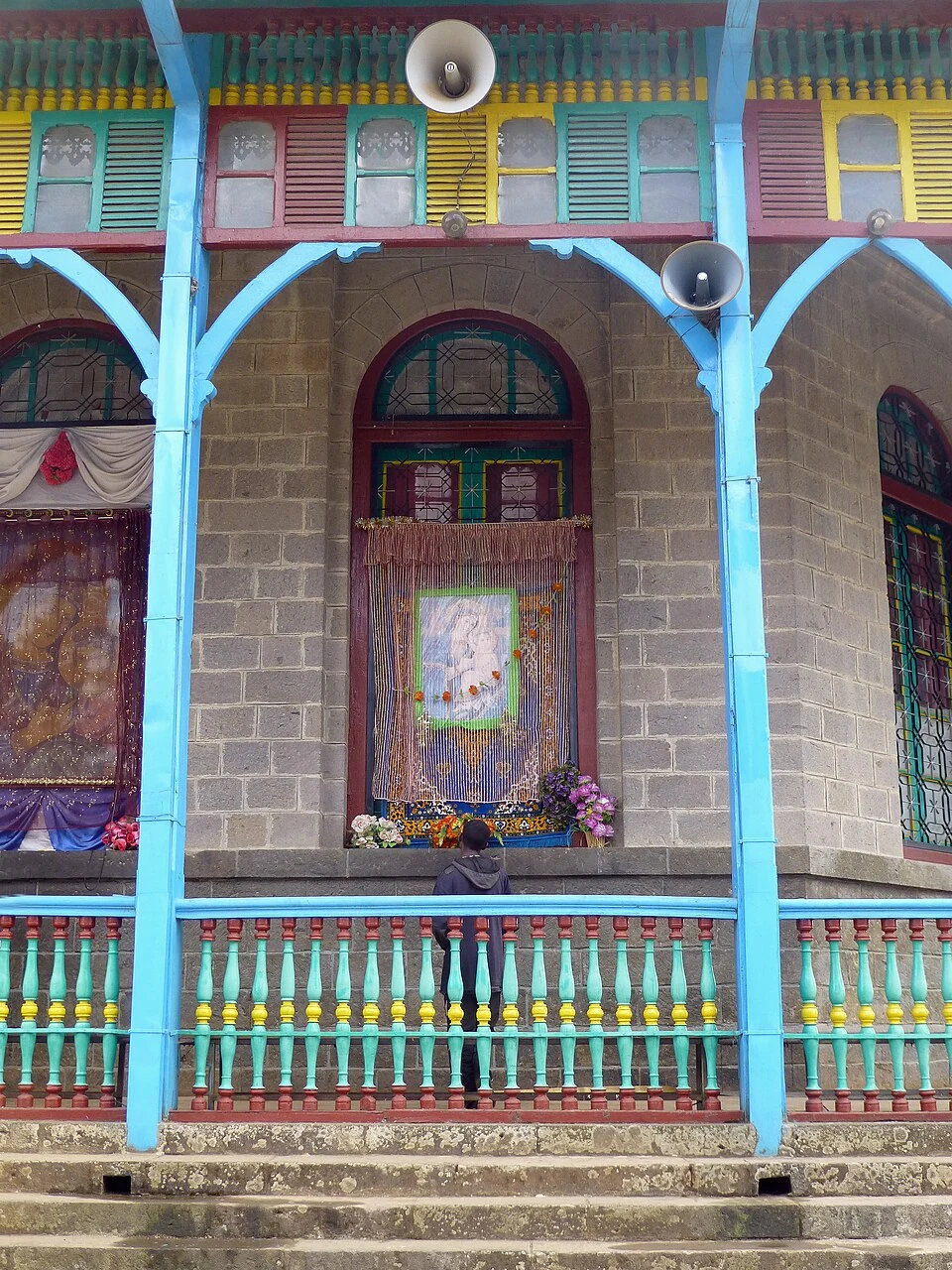 Entoto Maryam Church: arched opening and painted timber veranda.