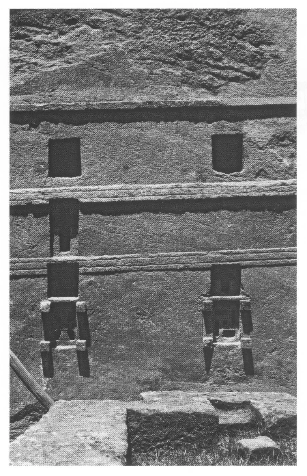 Beta Maryam, the east end, showing windows cut into the false string courses, 1997. Part of the raised baptistery is visible in the foreground.