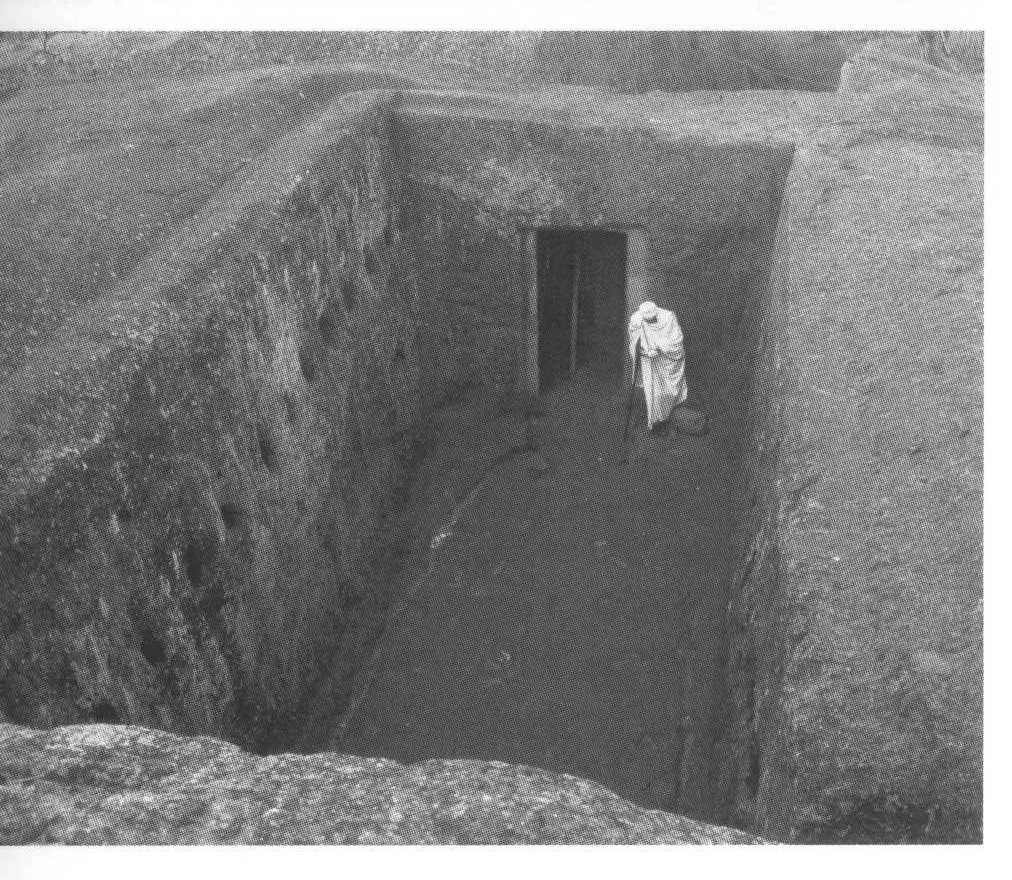 Lalibela, the old western approach to Beta Maryam, viewed from the east, 2006. Beta Golgotha was subsequently excavated from the rock beneath this feature.