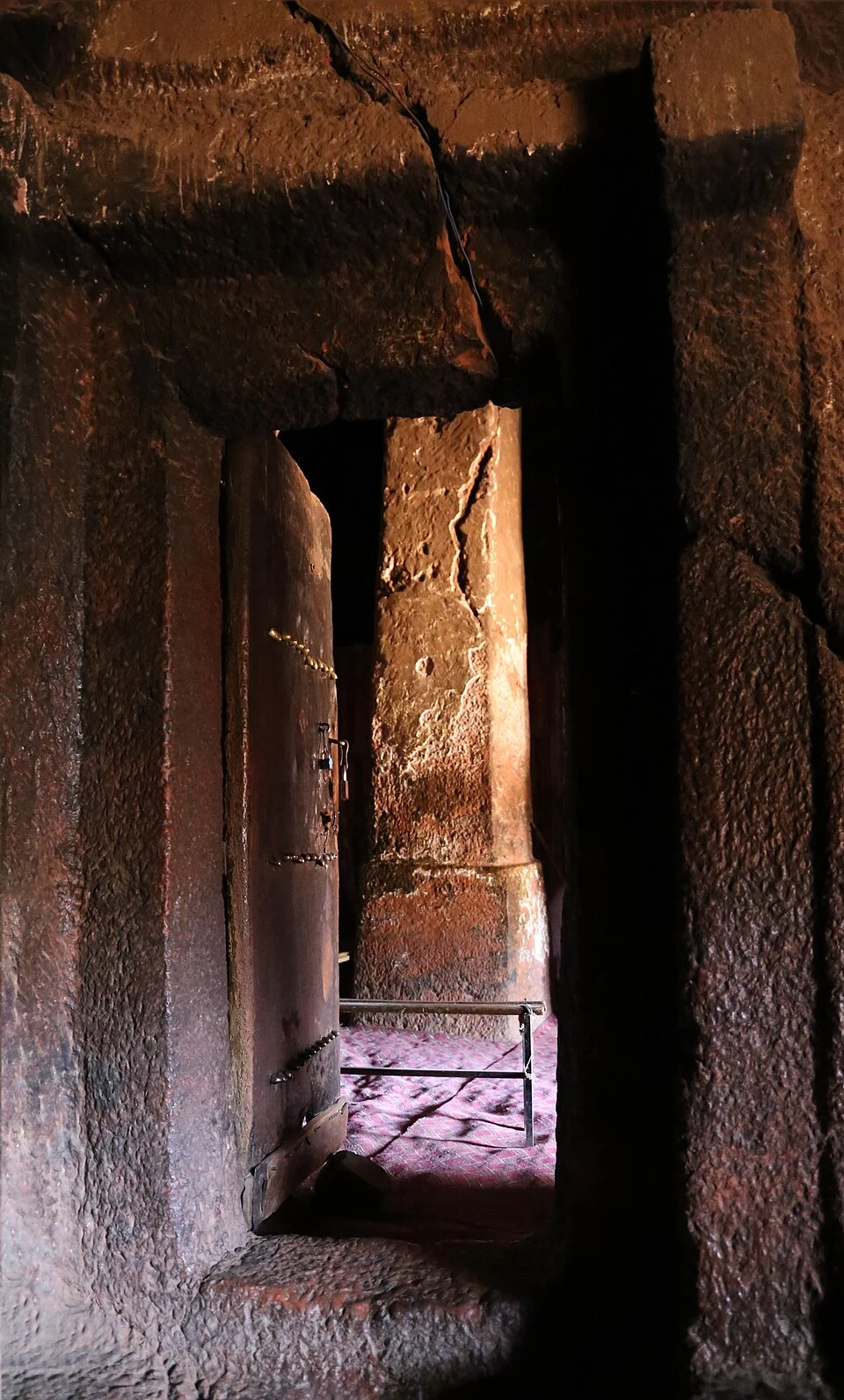 Rock-cut interior doorway at Bilbila Giyorgis.
