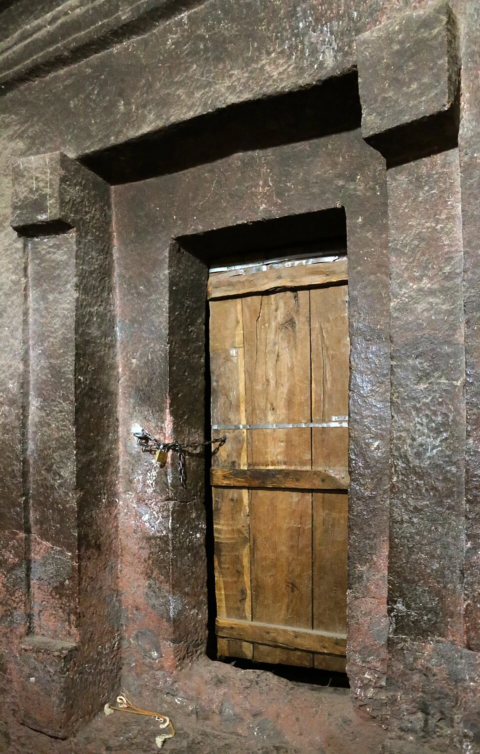Biete Maskal: recessed doorway with a timber door.