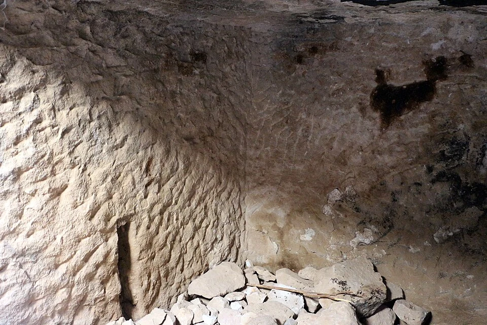 The ‘Egyptian’ Tomb at Qohaito: rock-cut interior wall and chamber floor.