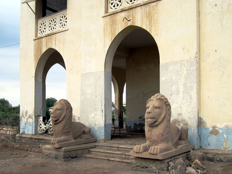 Imperial Palace, Massawa: arched entrance flanked by carved lions.