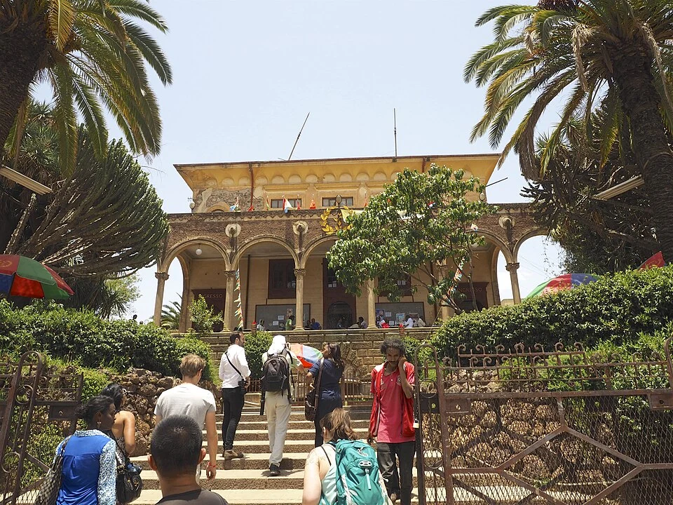 Steps and columned entrance of the Asmara Opera House.